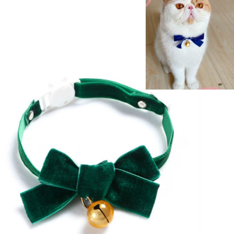 Velvet pet collar with green bowknot and bell, adjustable strap.