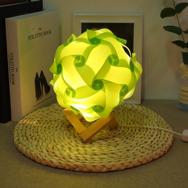 Green USB bedside night light with wood base, round paper-flower shade, glowing