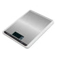 White kitchen digital scale with brushed stainless top and green digital weight display