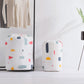Quilt storage bags with drawstring tops in geometric print, small and large