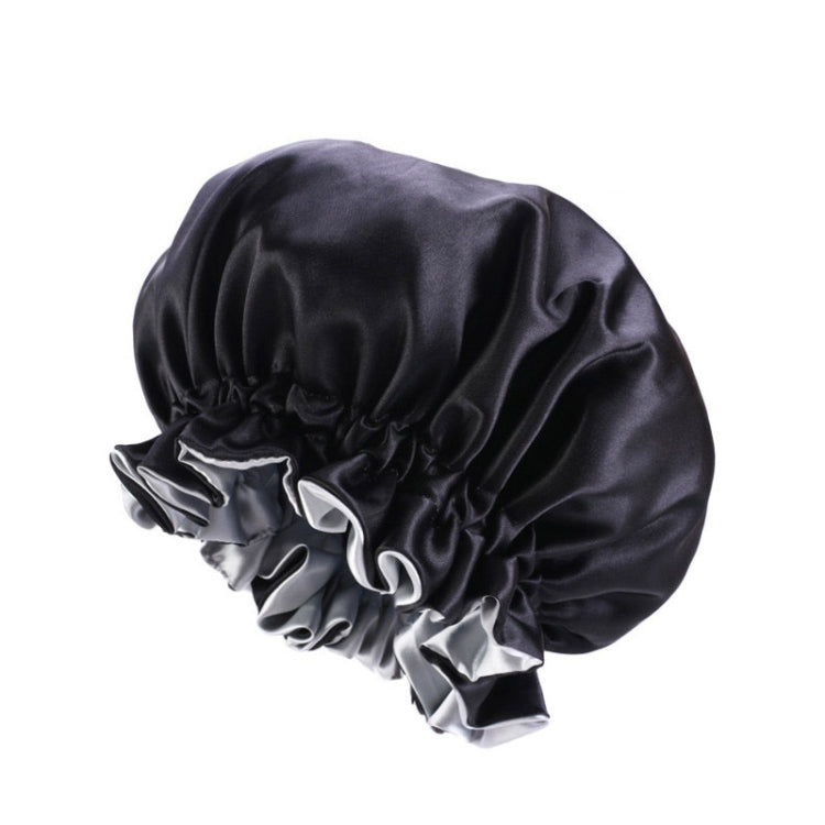 Dark satin round sleep hat with gathered crown and light gray ruffle trim