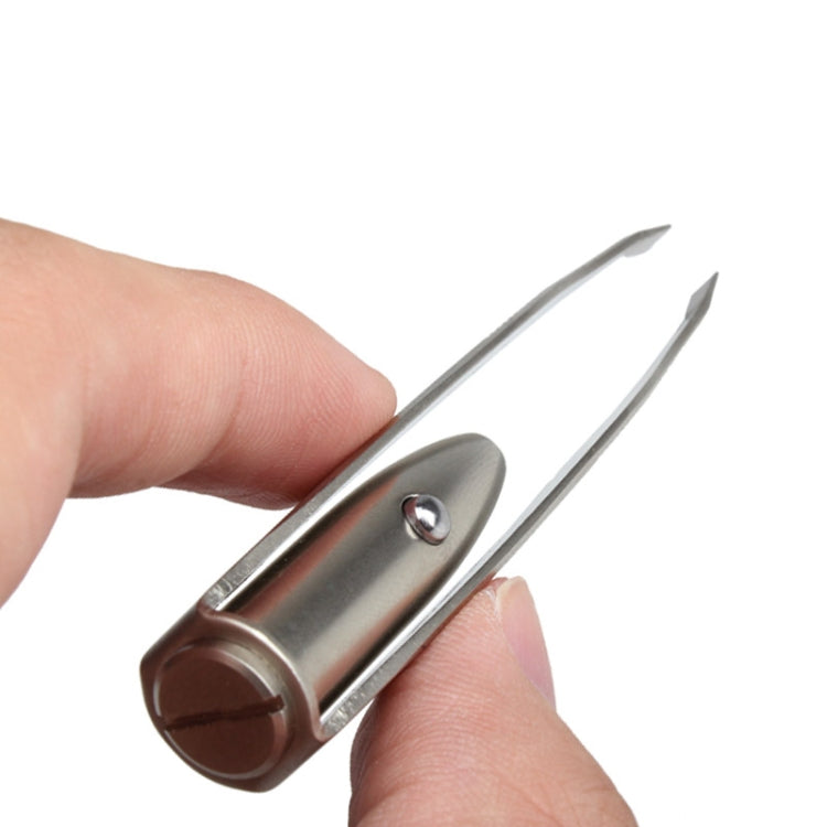 Eyebrow tweezer tool with LED button and two angled metal tweezers