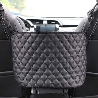 Black quilted car seat storage pocket with diamond pattern, between front seats