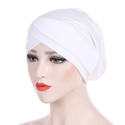 White stretch headscarf cap with forehead cross wrap and folded crown