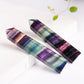 Two multicolor fluorite crystal hexagonal column ornaments with banded stripes