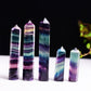 Group of multicolor fluorite crystal hexagonal column ornaments with faceted points