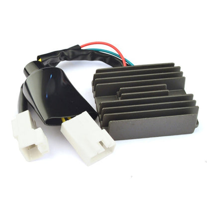 Motorcycle rectifier/regulator with black heatsink, white connectors, and wire harness