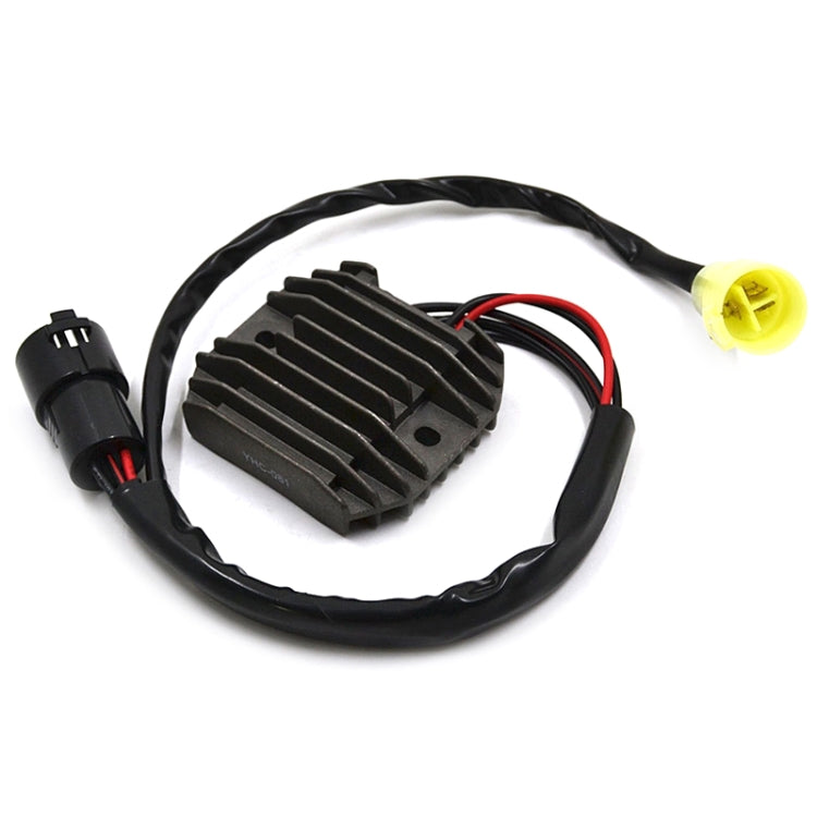 Motorcycle rectifier regulator with black heat-sink and multi-wire harness, side view