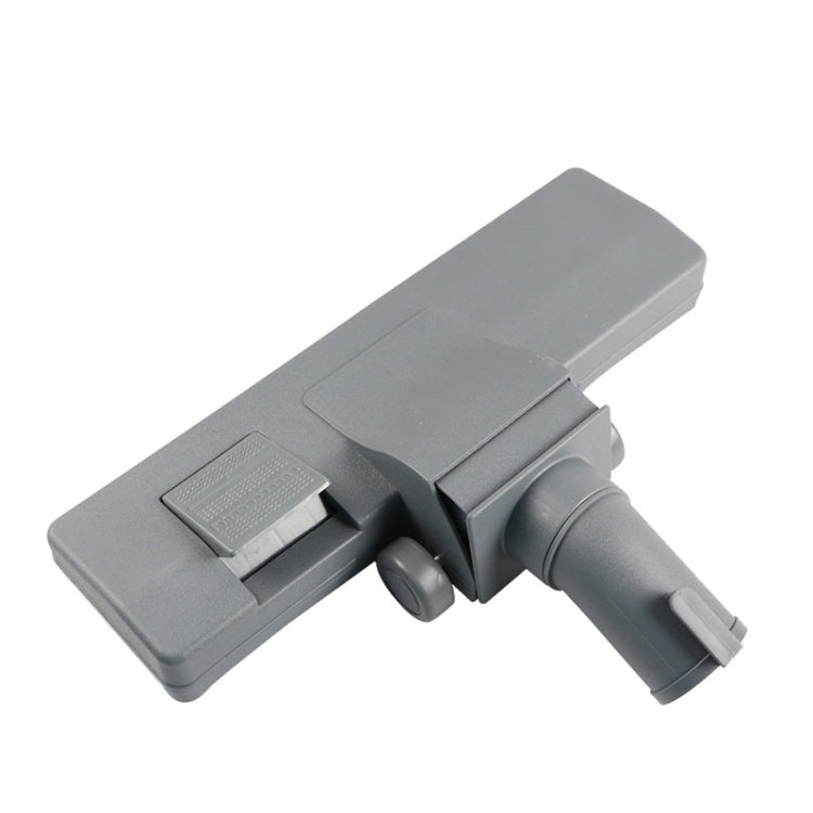 Gray vacuum cleaner floor brush head with side nozzle and caster wheels