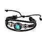 Black braided leather bracelet with turquoise zodiac round cabochon and metal beads