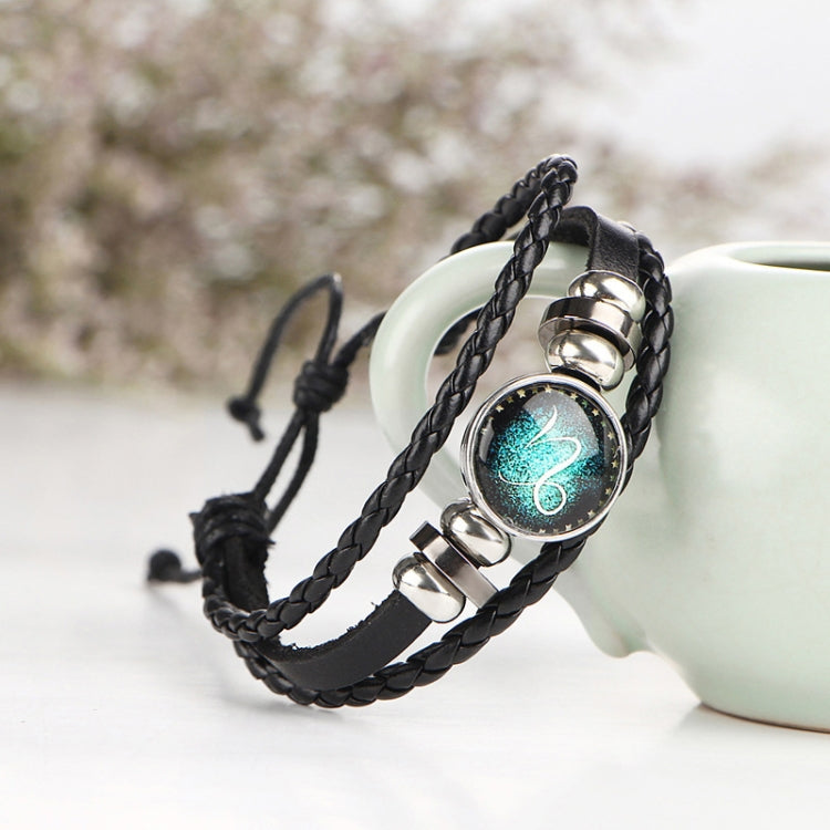 Black leather and braided bracelet with turquoise zodiac charm clasp and rings