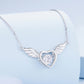 Silver heart pendant necklace with round white zircon and small wing accents