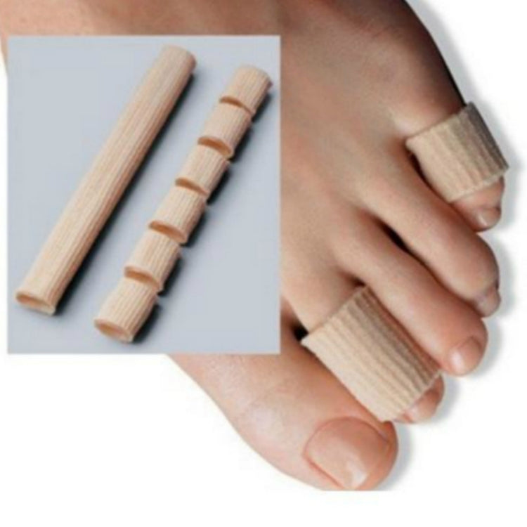Beige silicone toe separator set worn on toes, ribbed protective sleeves