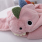 Pink dinosaur plush hat with scarf, one-size, close-up of hood face and horns