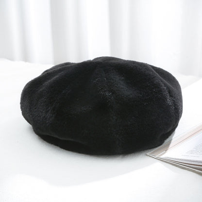 Plush women’s beret hat, dark black tone, soft fuzzy texture.