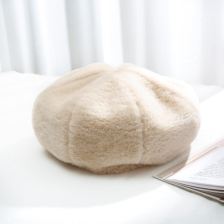 Plush women’s beret hat, cream/light beige color, soft fuzzy texture.