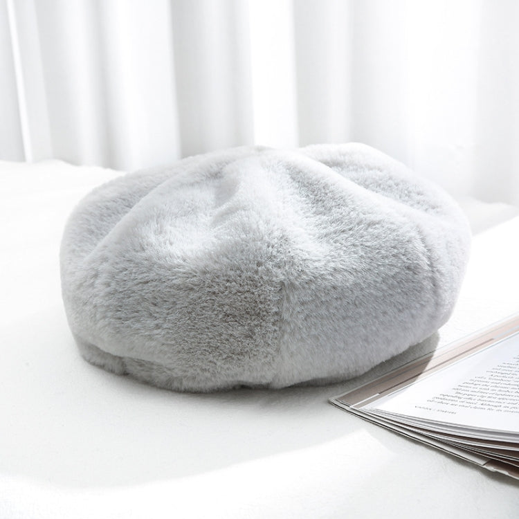 Plush women’s beret hat, light gray color, soft fuzzy texture.