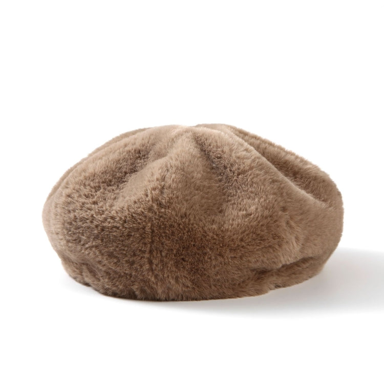 Plush women’s beret hat, taupe beige color, soft fuzzy texture.