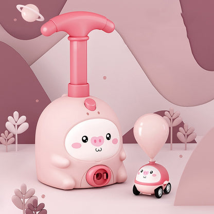 Pink piggy air-powered balloon scooter toy with large launcher, pig face and small car