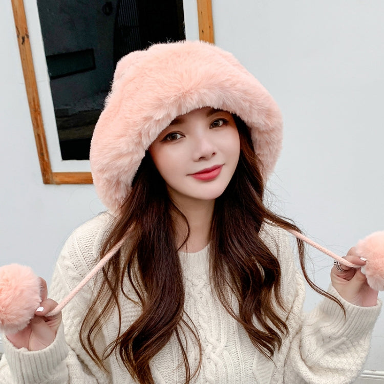 Pink faux-fur trimmed knitted skullcap with dangling pom-pom ties