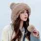Beige faux-fur knitted skullcap with side pom-pom ball