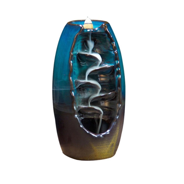 Blue ceramic lotus incense burner vase shape with smoke plume