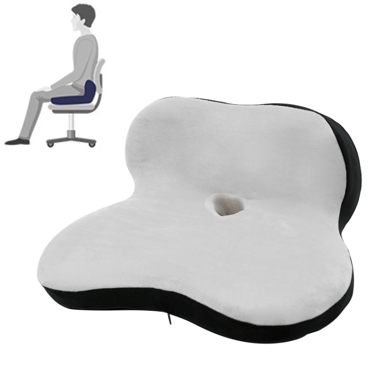 Petal-shaped memory foam cushion, light gray with black trim and raised center hole