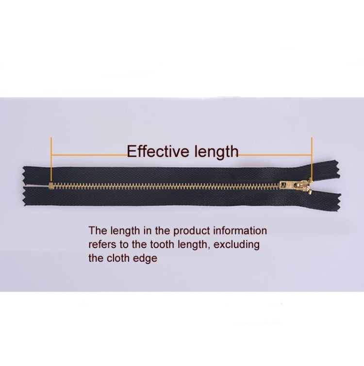 Dark navy zipper showing effective length measurement and gold slider