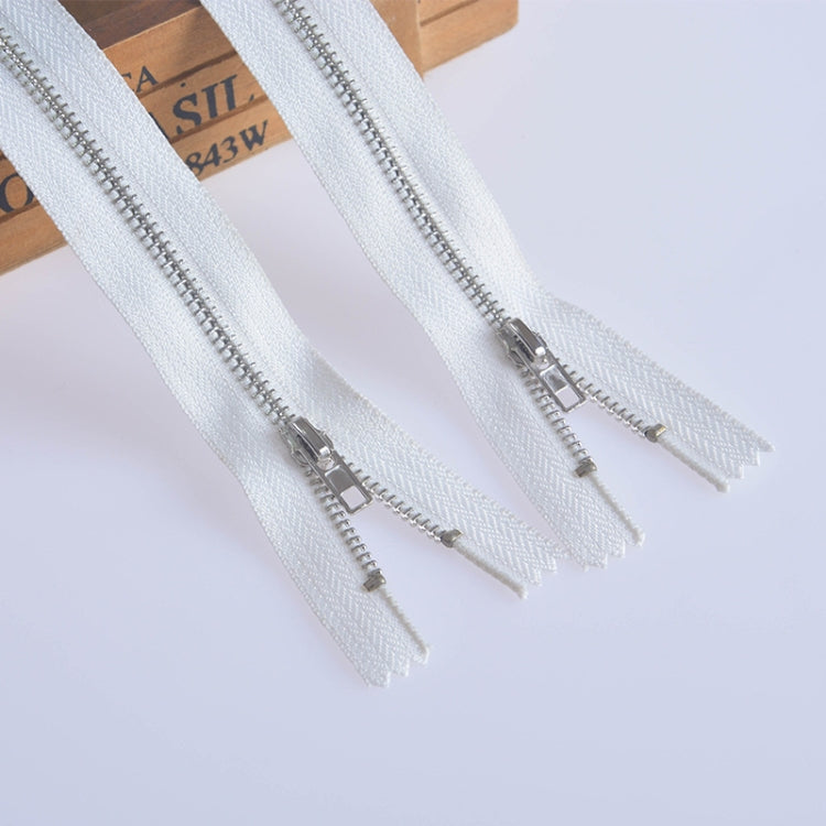 No.3 metal zippers with white tape and silver teeth, laid in parallel