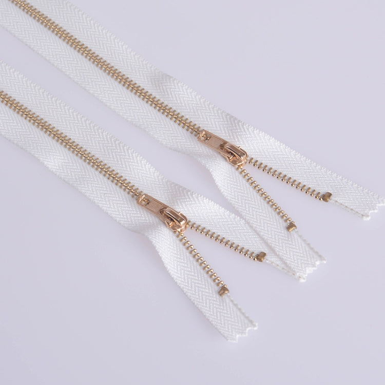 No.3 metal zipper placket, light gold teeth, white tape, pull tabs visible