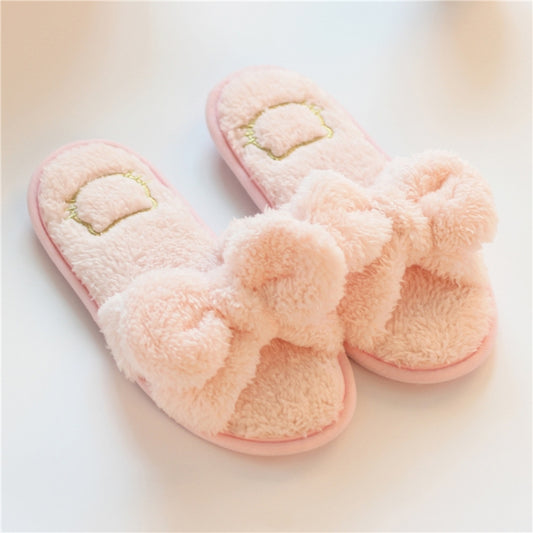 Light pink plush pair of slide slippers with knot bow and heart patch