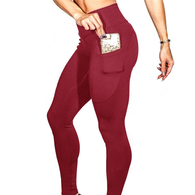 High-waist yoga leggings with side pockets, red color, stretchy full-length workout bottoms