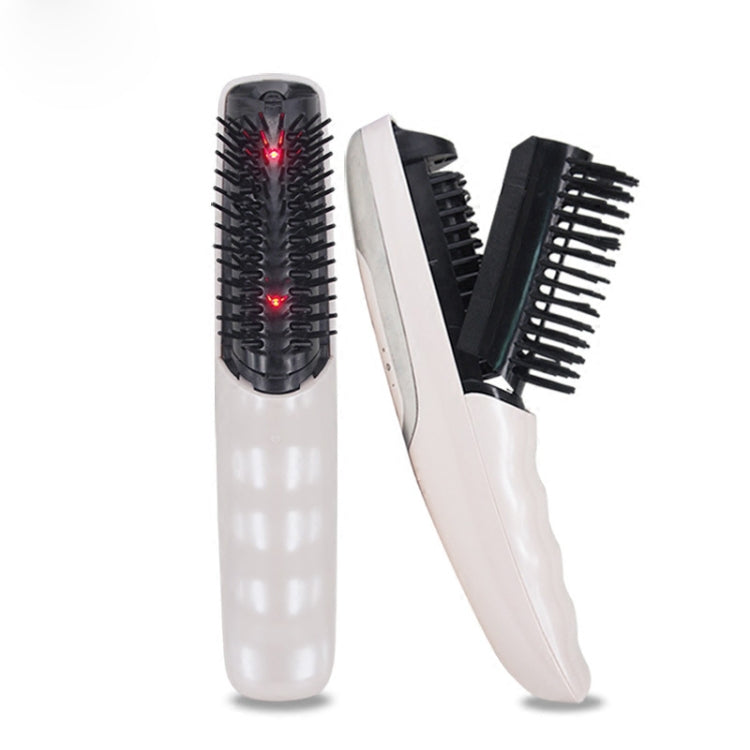 Electric massage comb with black bristle head and red LED glow