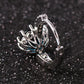 Sterling silver hoop earring with butterfly-shaped zircon details