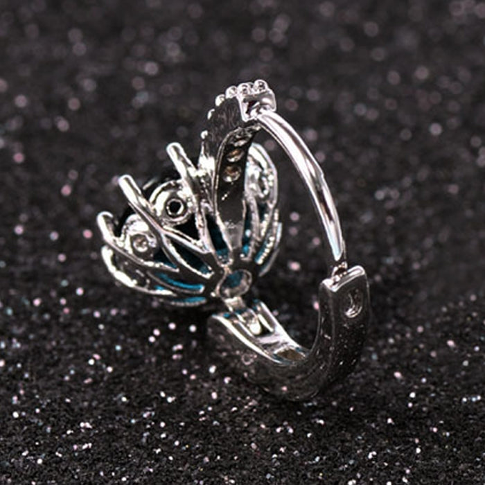 Sterling silver hoop earring with butterfly-shaped zircon details