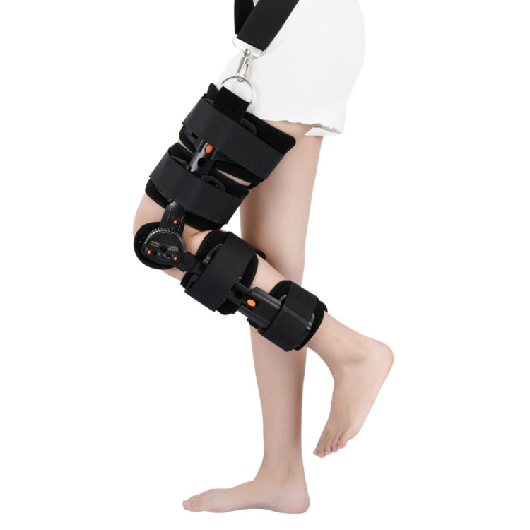 Adjustable black knee brace with multiple hook-and-loop straps and hinged support