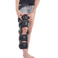 Adjustable black knee brace close-up with orange accents, pads, and side straps