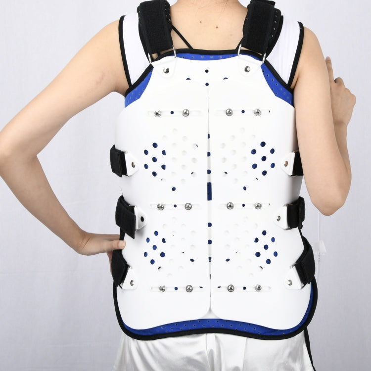 Thoracolumbar fixation brace front view with white shell, dotted backing, and black fastening blocks