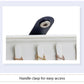 Jewelry box handle clasp with navy strap; flannel insert holding earrings