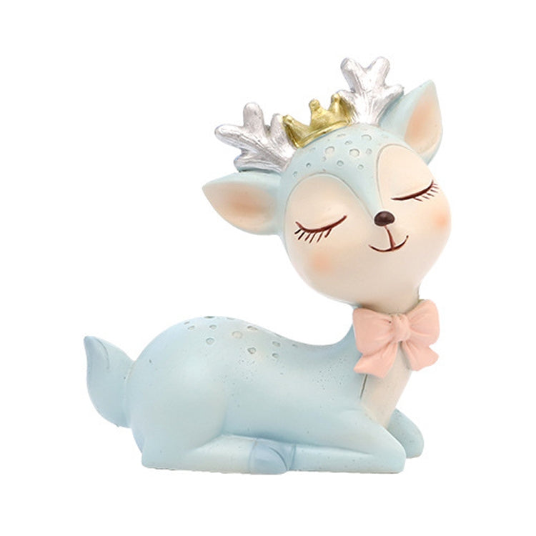 Blue cartoon deer resin decoration, lying down with bow and antler details