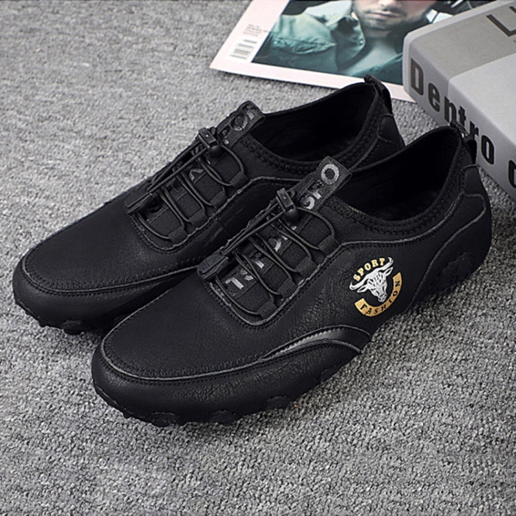 Black leather lace-up sneakers with adjustable buckles and textured tread sole