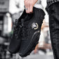 Black leather lace-up sneakers with side logo and chunky rubber tread sole