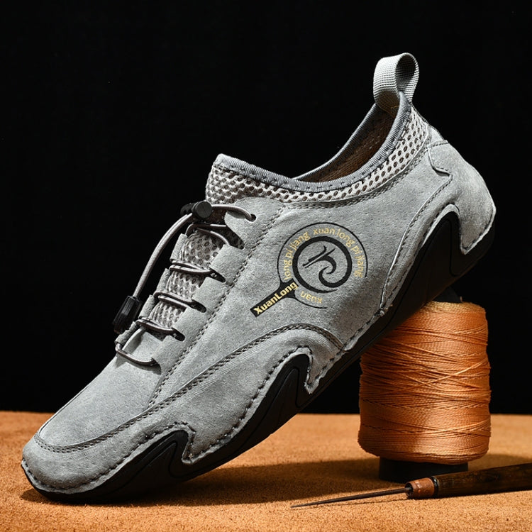 Men's gray lace-up sneakers with heel pull tab, logo patch, chunky rubber sole