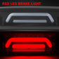 Close-up of red LED brake light glow in smoked-lens high-mounted housing