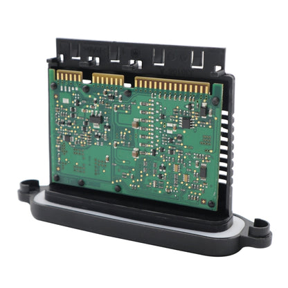 LED headlight control module with green circuit board and black connector housing