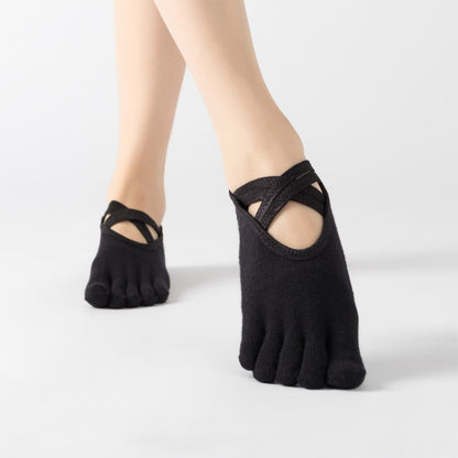 Black five-finger yoga socks with crisscross strap over the toes, full toe style