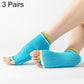 Teal blue open-toe five-finger yoga socks with dotted anti-slip soles and rainbow cuffs