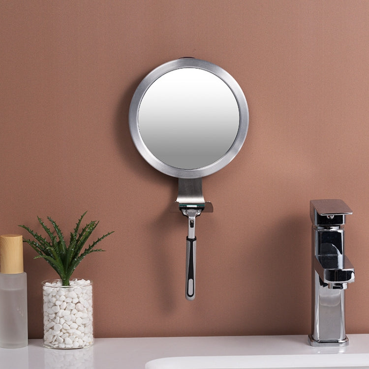 Round bathroom mirror with suction base, folding stand, and short handle