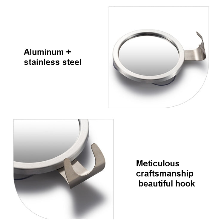 Round mirror with curved metal frame and wall hook on suction stand