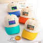 Assorted kids baseball caps set: beige crown with yellow, blue, orange, and teal brims